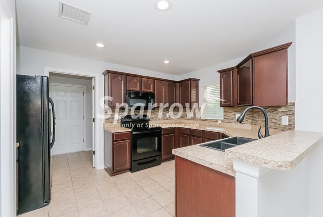 Building Photo - 7215 Forest Mere Dr