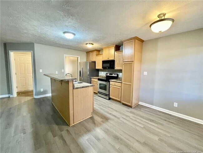 Foto del edificio - 6928 Bostick Dr
