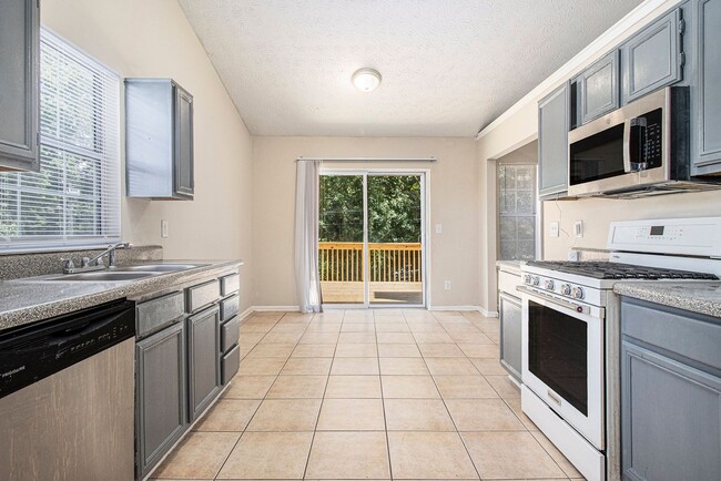 Building Photo - Rare Find: 4 Bedroom + 3 Bathroom + 2-Car ...