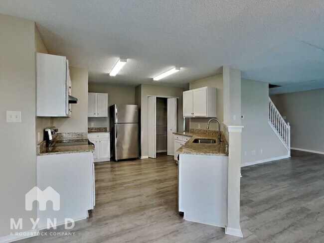 Foto del edificio - 8431 Adams Mills Pl