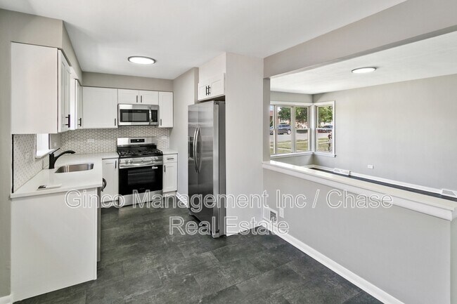 Foto del edificio - 7704 McVicker Ave