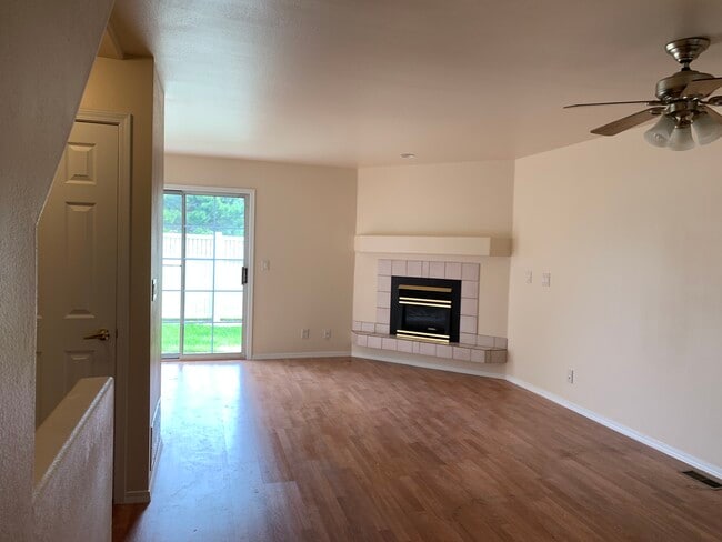 Living and Dining Room with fireplace. - 6253 Colony Cir