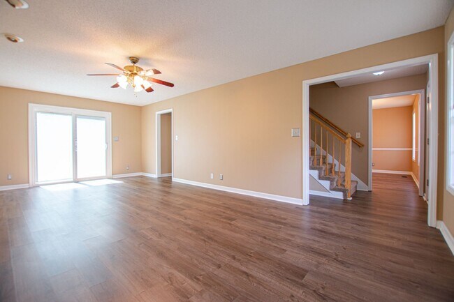 Building Photo - Pet Friendly Three Bedroom with Bonus!