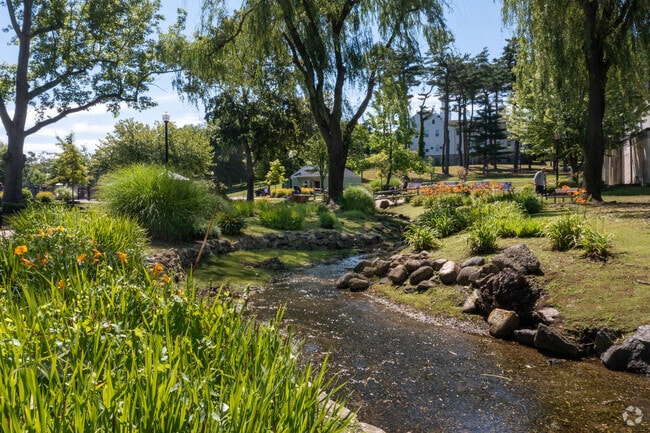 Stroll along the path around the pond at Heckscher Park in Huntington.