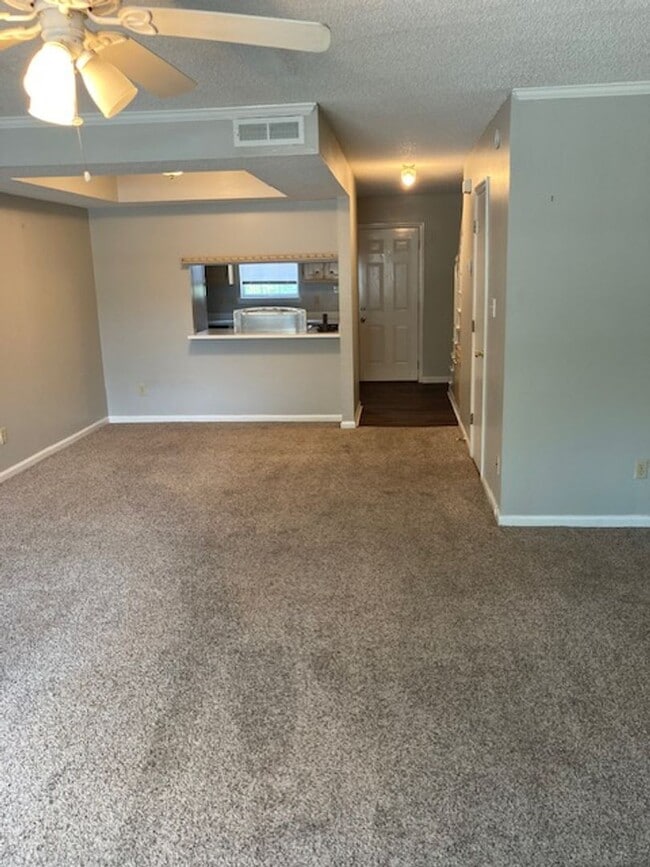 Building Photo - TWO BEDROOM TOWNHOUSE **(Special; 1st 6mo ...