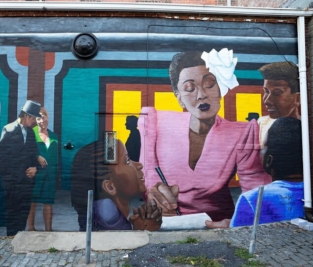 Several murals of jazz legend Billie Holiday are located along North Durham Street