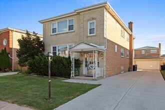 Building Photo - 8317 W Summerdale Ave