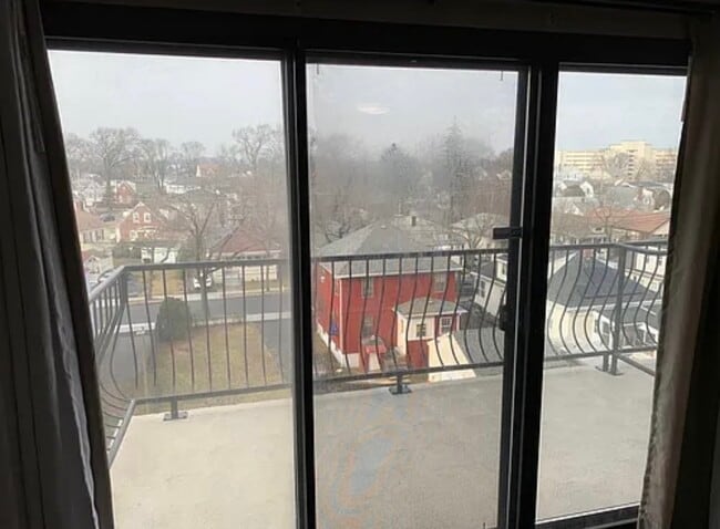 Balcony (overlooks 2 deeded parking spots, sometimes see fireworks during holidays) - 500 Washington St