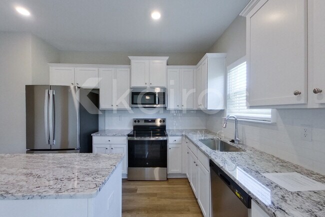 Foto del edificio - 7034 Foggy River Dr