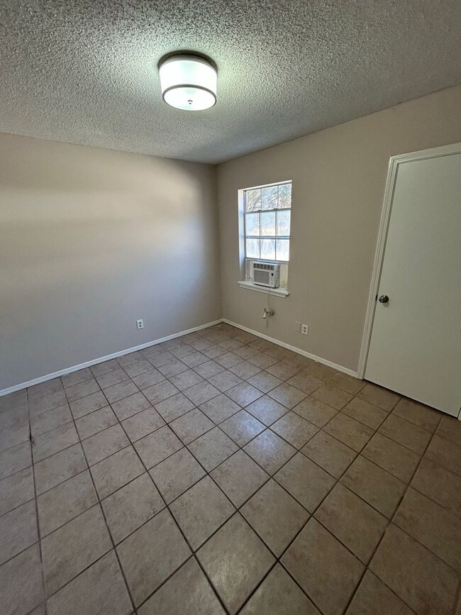 Building Photo - This Delightful Duplex in Carrollton!