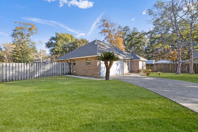 Building Photo - 9524 Pointe Aux Chenes Rd