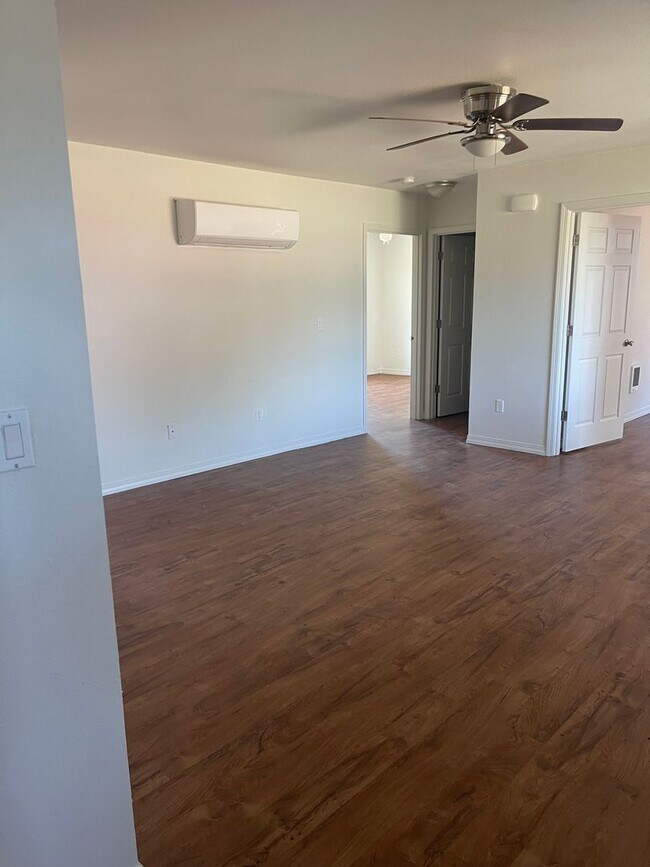 Building Photo - 4-Bedroom Home with Open Floor Plan and Fe...