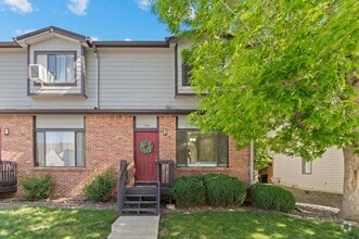 Building Photo - 10693 W 63rd Dr