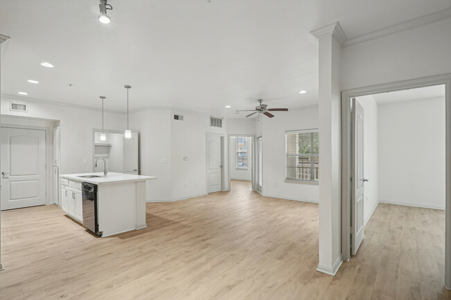 Large kitchen island and timeless backsplash - The Henry at Jones Road