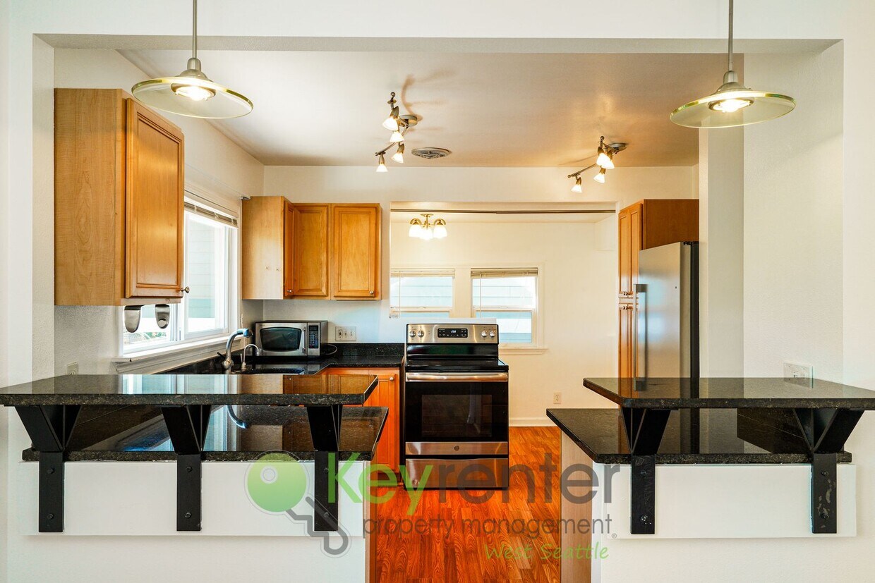 **Rent Special** Spacious 4-Bed Home Near ... - Versatile 4-Bedroom with Patio, Parking, a...