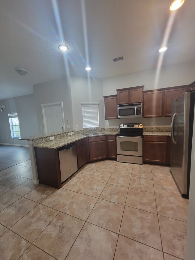 Building Photo - 4107 Shadetree Ln