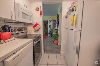 Building Photo - 3625 N Country Club Dr