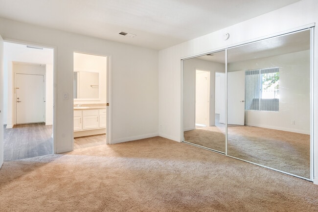 Mirrored closet doors - Monterey Pines Apartments