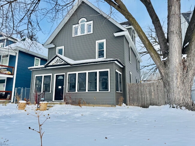 Building Photo - "Spacious 6-Bedroom Gem with Gleaming New Hardwood Floors in Minneapolis!"