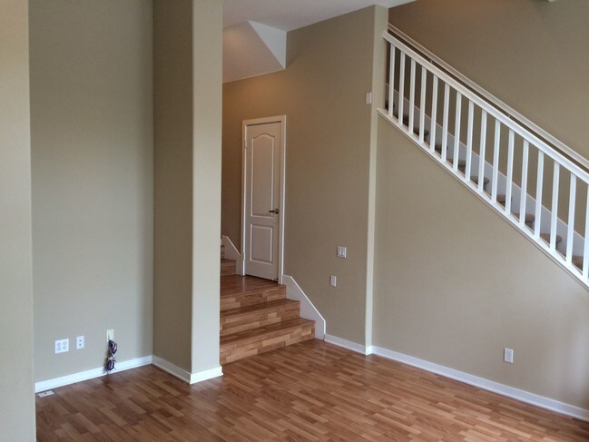 Main living space and 1/2 bathroom - 5511 W 149th Pl