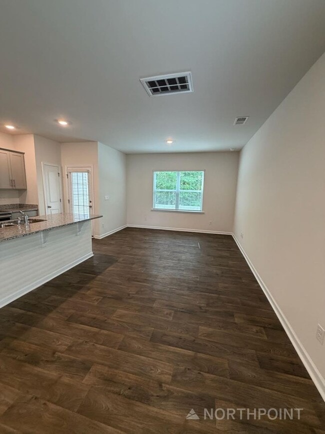 Building Photo - Brand new 3 bedroom townhome available for immediate move in!