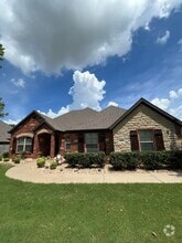 Building Photo - 4007 SW Hollowbrook St