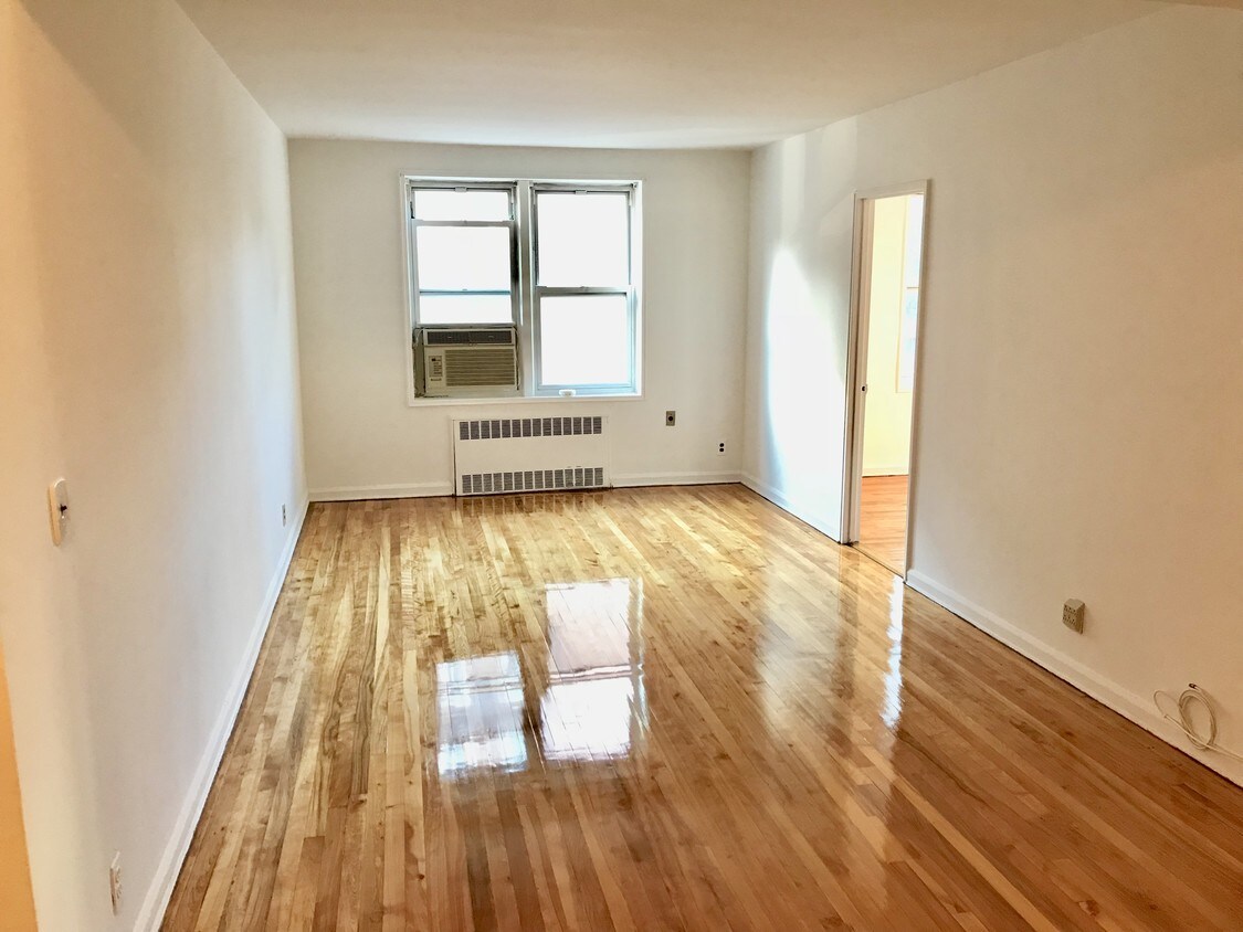 Living Area - 85-10 34th Ave
