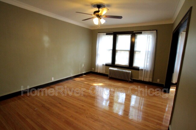 Building Photo - 10928 S Vernon Ave