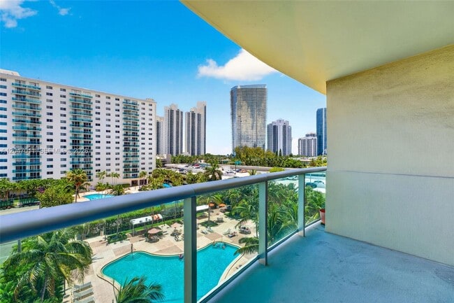 Building Photo - 19380 Collins Ave