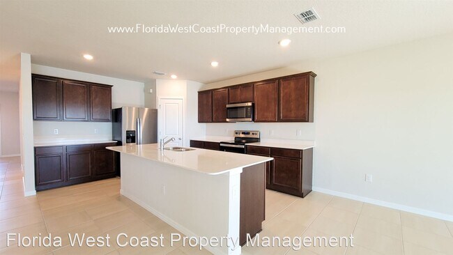 Building Photo - 4 br, 2.5 bath House - 8431 Abalone Loop