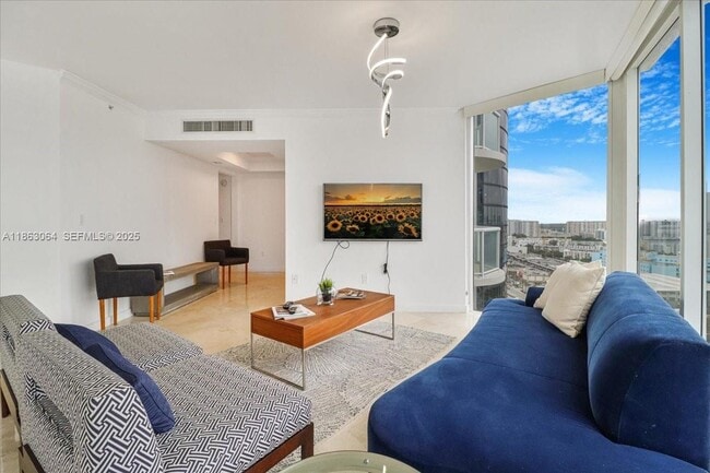 Building Photo - 18671 Collins Ave