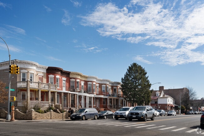 Bow-front row houses line the streets of Bensonhurst, Brooklyn.