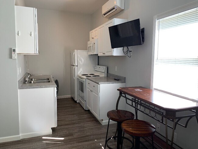 Kitchen includes washer/dryer combo - 1616 N 2nd St
