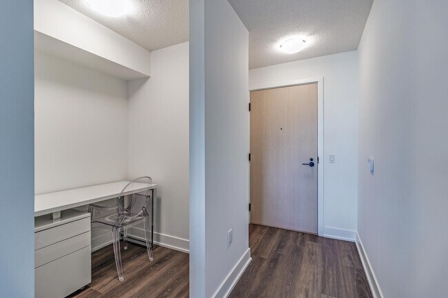 Building Photo - One Plus Den Furnished unit