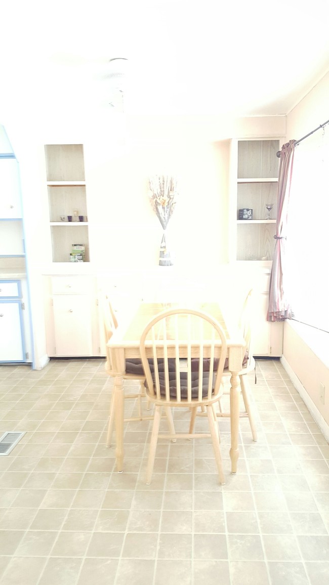 DINING ROOM WITH BUILT IN CABINET - 7331 Malaga Ave