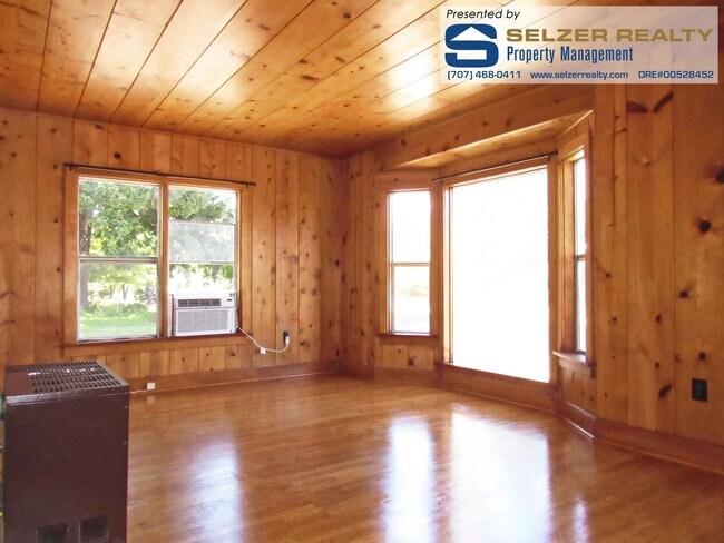 Building Photo - Cozy 2 bd. cottage on the westside; walkin...