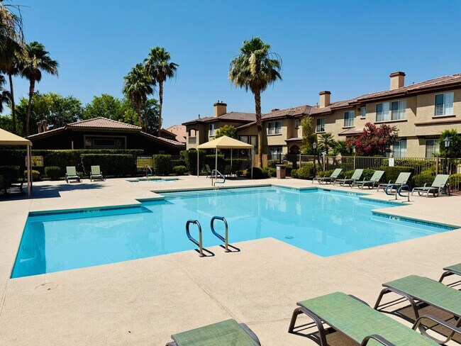 Building Photo - Immaculate and Inviting Two-Story Condo in...