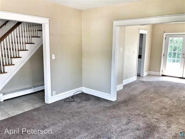Building Photo - 3 br, 1 bath House - 825 N 10th Ave E