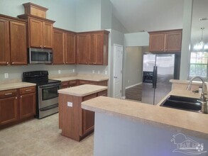 Building Photo - 5863 Chi Chi Cir