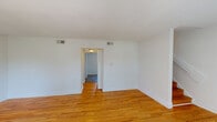 Located at 2101 Gorman St in Raleigh, NC, this two-story, 3-bedroom, 3-bathroom home offers a practical and well-organized layout across two evenly sized floors. Warm hardwood flooring flows throughout the majority of the home, lending a cohesive and inviting character to the living spaces.

The main floor features a living room with natural light streaming through windows, a dedicated dining room, and a functional kitchen equipped with white cabinetry, granite-style countertops, a stainless steel sink, and tile flooring. A utility room and bathroom round out the first level, along with hallways and staircase access to the upper floor.

Upstairs, three bedrooms provide comfortable accommodations, each featuring hardwood floors and ceiling fans. The generously sized primary bedroom offers ample space and connects to the hallway through panel-style doors. The bathrooms are finished with clean white subway tile surrounds in the tub/shower areas, offering a classic and timeless look.

Throughout the home, crisp white walls, clean baseboards, and consistent finishes create a bright and neutral palette. Multiple closets and hallway spaces add to the home's storage and circulation efficiency. The overall ambiance is clean, functional, and move-in ready, well-suited for comfortable everyday living in Raleigh.
