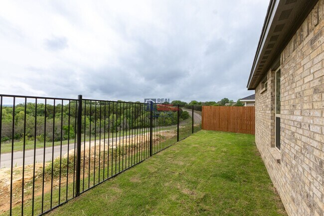 Building Photo - Beautiful 4 Bedroom Home with Covered Patio & Hill Country Views