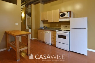 Building Photo - 10024-10024 Jasper Ave