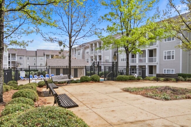Building Photo - Capstone Quarters 2 Bed 2 Bath Condo! Available Fall 2026!