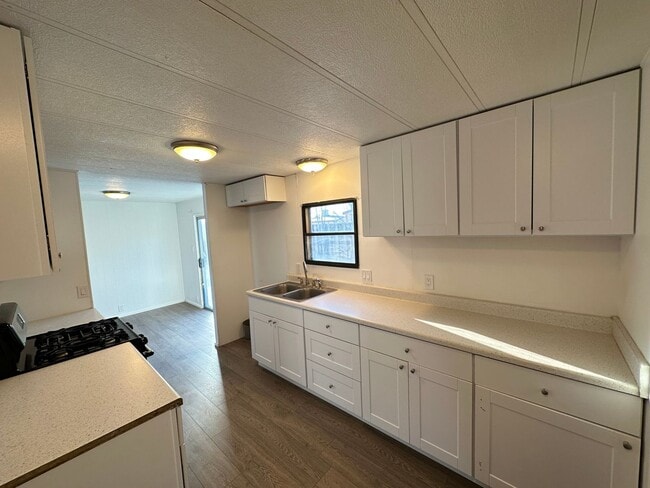 Building Photo - This charming trailer has been lovingly updated and is move-in ready.