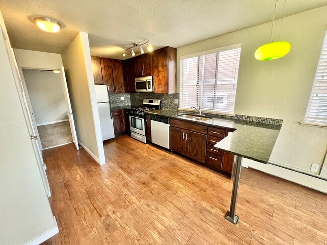 Experience culinary delight in a beautifully designed kitchen with ample space and natural light. - Sublime