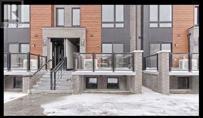 Photo du bâtiment - 245 McLevin Ave