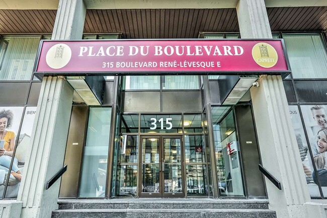 Photo du bâtiment - Place Du Boulevard Apartments