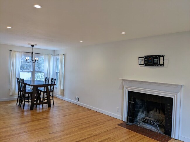 Open concept living and dining space spans the entire length of the home - 166 Arundel Ave