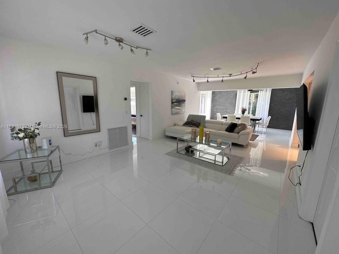 Photo - 21230 Northeast 24th Court, Miami, FL 33180 - 3 BR 2 BA house