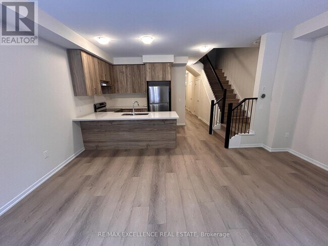 Photo du bâtiment - 9 Radium Cmn